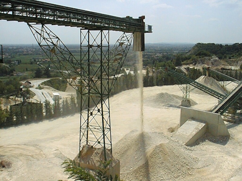 Clouds of dust during vertical fall of materials at 20mt height and movement on belt